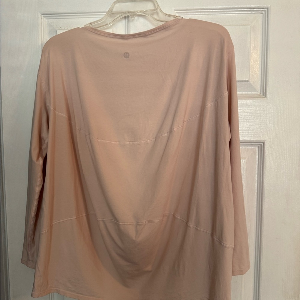Lululemon feather pink Back in Action long sleeve top
Size 6